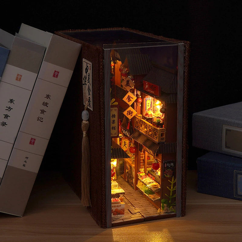 Book nook showing Chinese street market scene