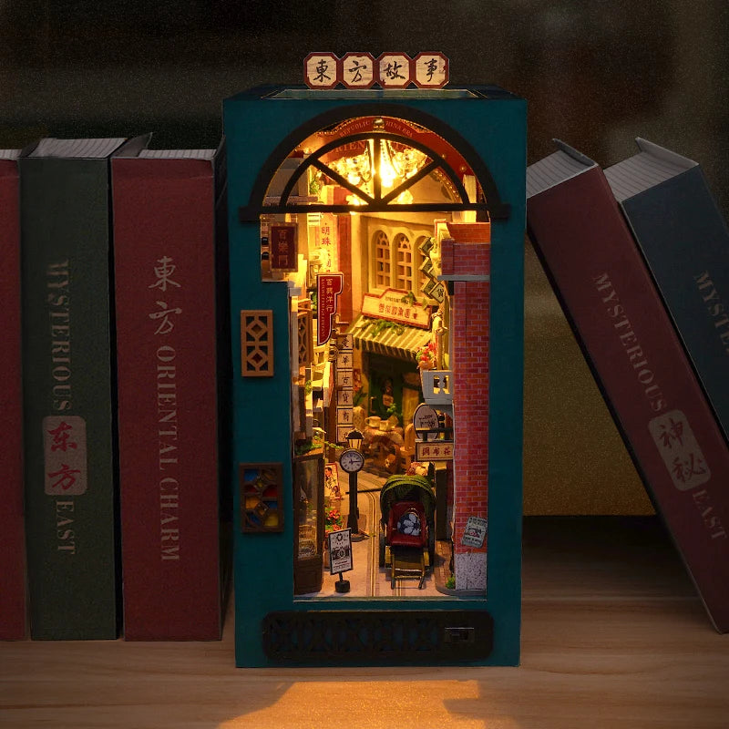 Illuminated Chinese street book nook with intricate details