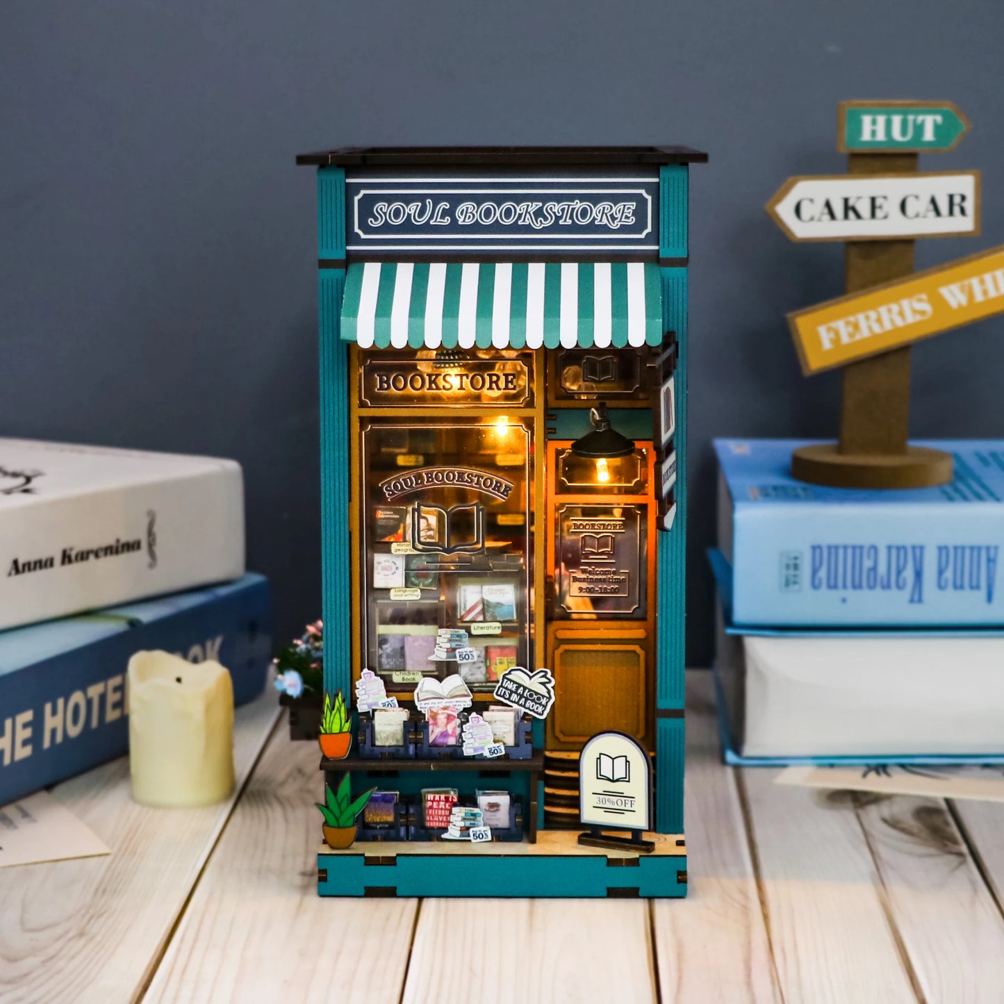 DIY book nook kit with teal facade and striped awning