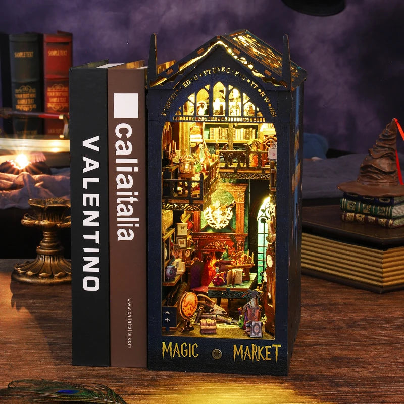 Magic Market Book Nook Kit placed between books