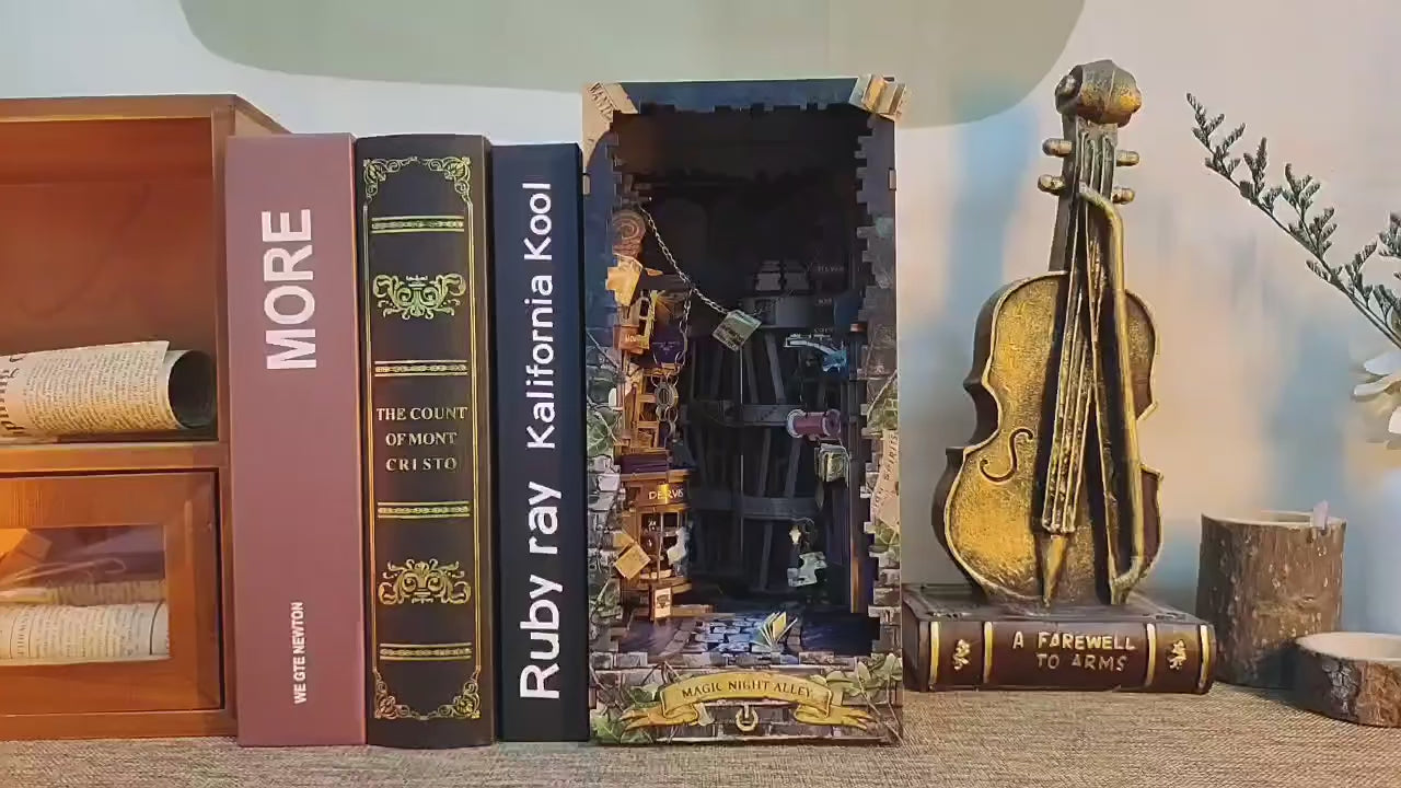 Magic Alley Book Nook Kit displayed with books and violin decor