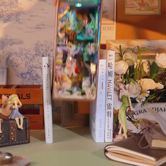 Book nook on a desk with books and decor